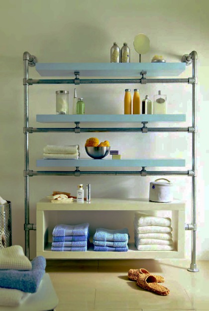 View into a bathroom of an IKEA hack shelf using IKEA single shelves and metal pipes affixed to the wall