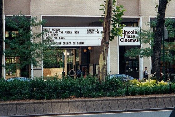 Entrance of Lincoln Plaza Cinemas with the sign for shows and show times.