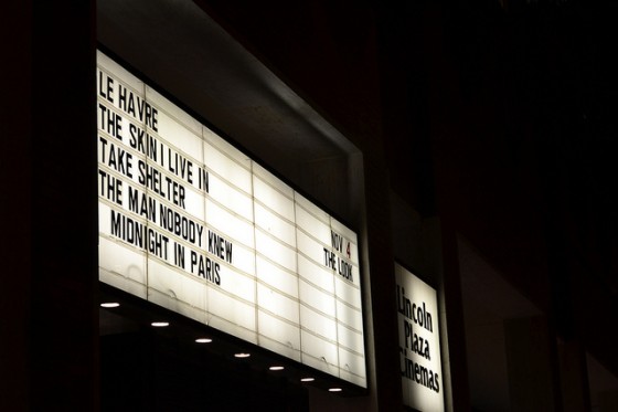 Sign with showtimes for Lincoln Plaza Cinema in Manhattan.