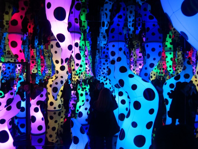 Brightly colored and spotted tentacles encompass the love is calling infinity room at David Zwirner