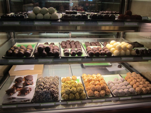 Picture of the display case at Kee's Chocolates truffles of a variety of different flavors