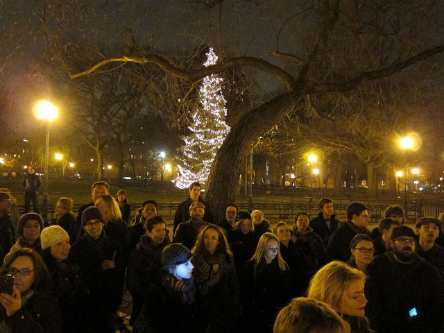 At the end of the Unsilent night march, crowds end up at the Tompkins Square Park Christmas Tree