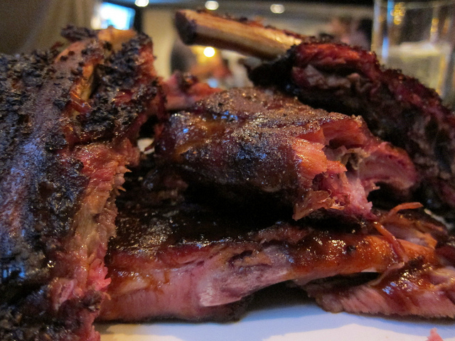 A stack of crispy BBQ ribs ordered for the Super Bowl in NYC