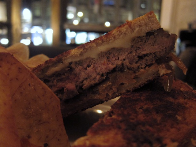 Image of the Empire Diner's Patty Melt, beef, with swiss cheese, caramelized onions on rye bread
