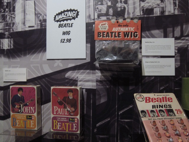 A wall displaying vintage The Beatles memorabilia at the NYPL of the Performing Arts exhibition in NYC