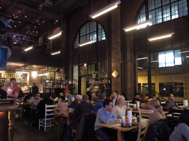 An image of the large space of Hill Country Barbecue's Brooklyn Location filled with customers