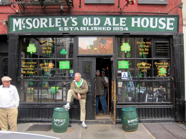 Storefront of McSorley's Irish Pub with patrons outside