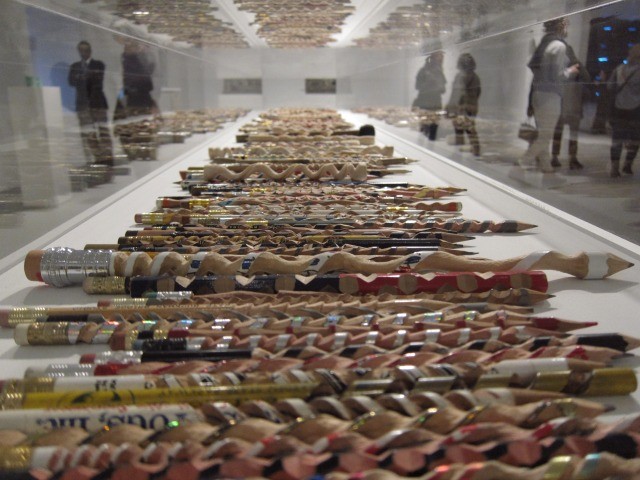 At the Whitney Biennial, Peter Schuyff has this installation of hundreds of carved pencils in a display case