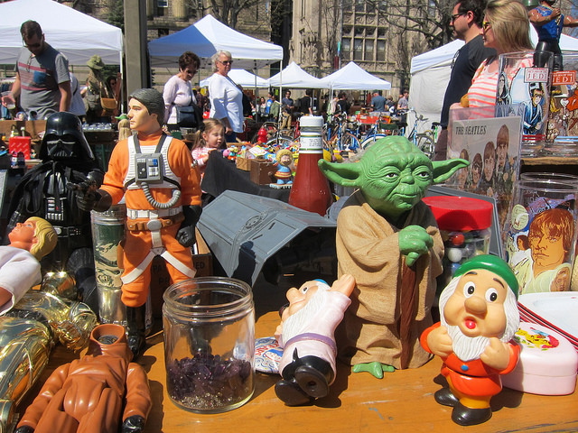 A Brooklyn Flea vendor table filled with a collection of movie memorabilia