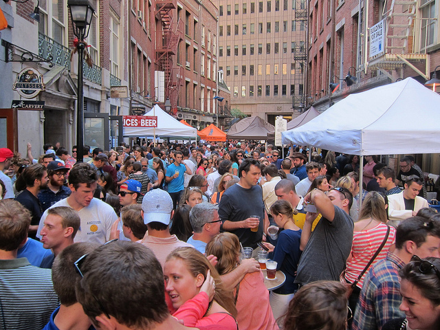 Image of the street packed with New Yorkers going tent to tent at the Stone Street Oyster Festival