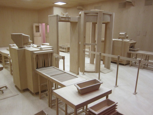 A wooden recreation of an airport security checkpoint by artist Roxy Paine
