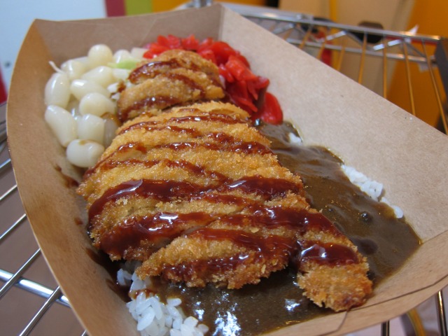 A closeup of chicken curry served from Go Go Curry from UrbanSpace's pop-up market in the Garment District