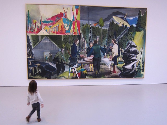 A young girl looks at a painting at Neo Rauch: At the Well, at David Zwirner 