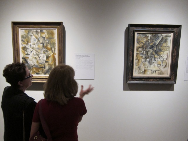 Patrons viewing the Cubism art at the Metropolitan Museum of Art