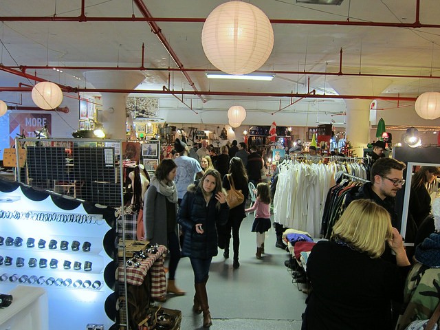 Sales during Holiday Market at Brooklyn Winter Flea indoor market.
