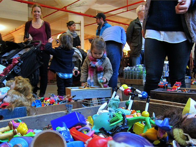 Kids playing with toys at the Brooklyn Winter Flea at Crown Heights.