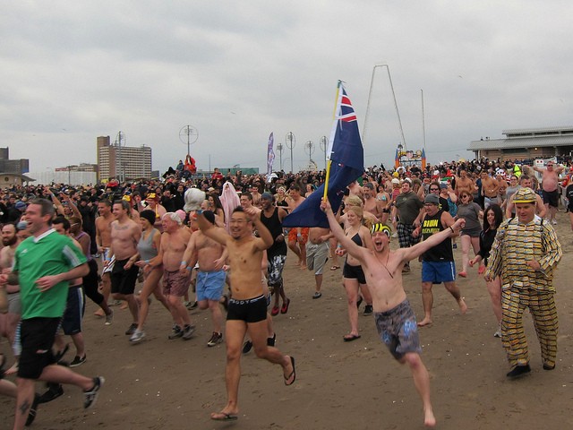 Polar Bears storm the beach for the icy Polar Bear Plunge