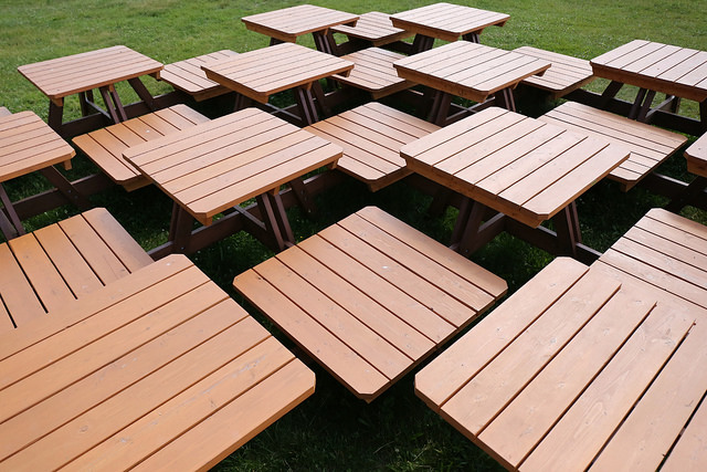 Common Picnic by Risa Puno: a sculpture using square picnic tables at Governors Island.