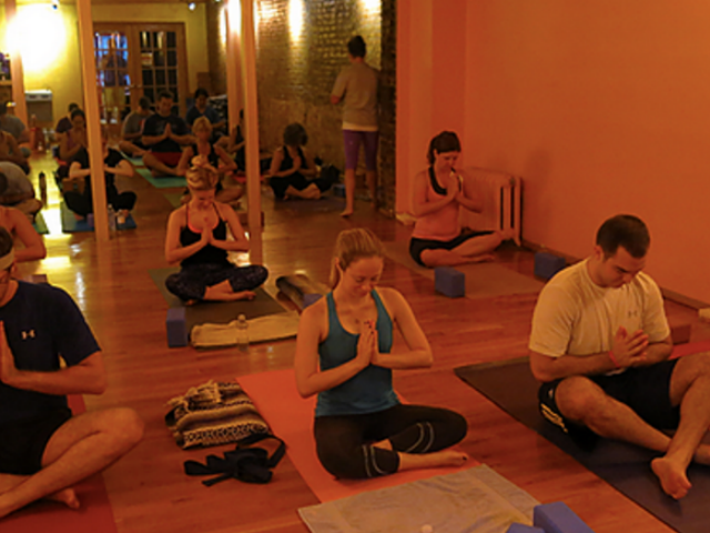 people doing yoga at NY Loves Yoga in Upper West Side, New York City
