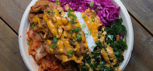 A taco bowl from El Diablo Tacos food truck in NYC with colorful and fresh Mexican ingredients.