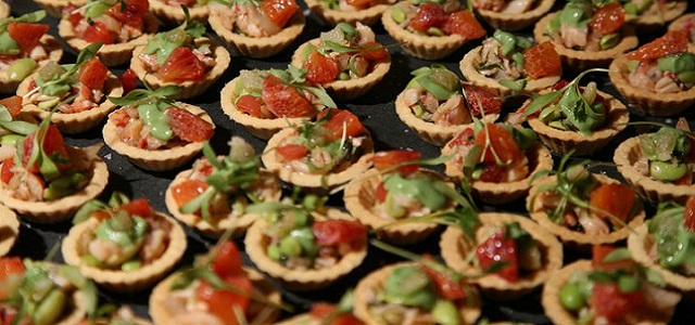 An array of sample sized dishes at the taste of the Upper West Side in Manhattan.