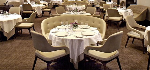 An interior view of Jean-Georges Nougatine's dining room in NYC.