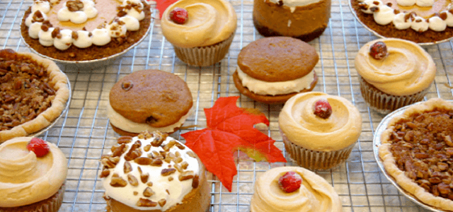 A tray of freshly baked seasonal cupcakes and whoopie pies.