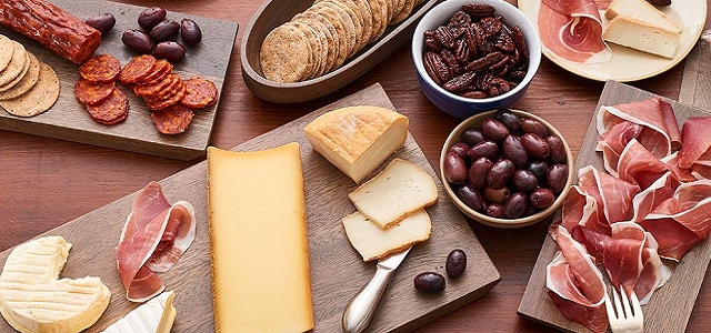 A spread of fresh cheeses, pepperoni, crackers, and olives for Thanksgiving from Zabar's.