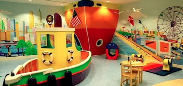 An interior view of a colorful playroom for children at one of Glenwood's luxury apartment buildings.