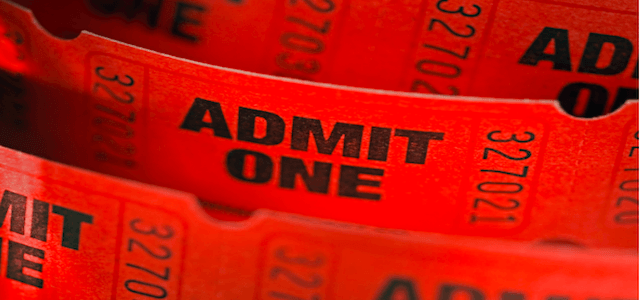 A roll of bright red "admit one" tickets.