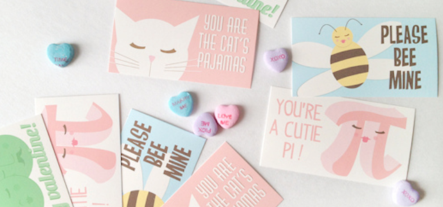 A collection of pastel colored Valentine's Day greeting cards.