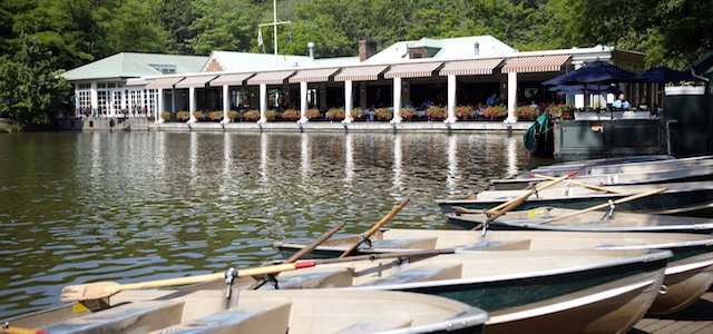 A view of Loeb Boathouse in Central Park with rowboats available to rent.