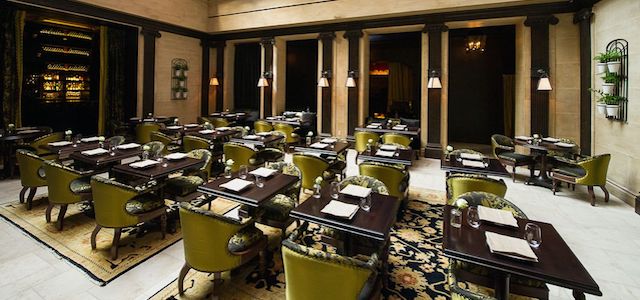 An interior view of the dining tables at The NoMad in NYC.