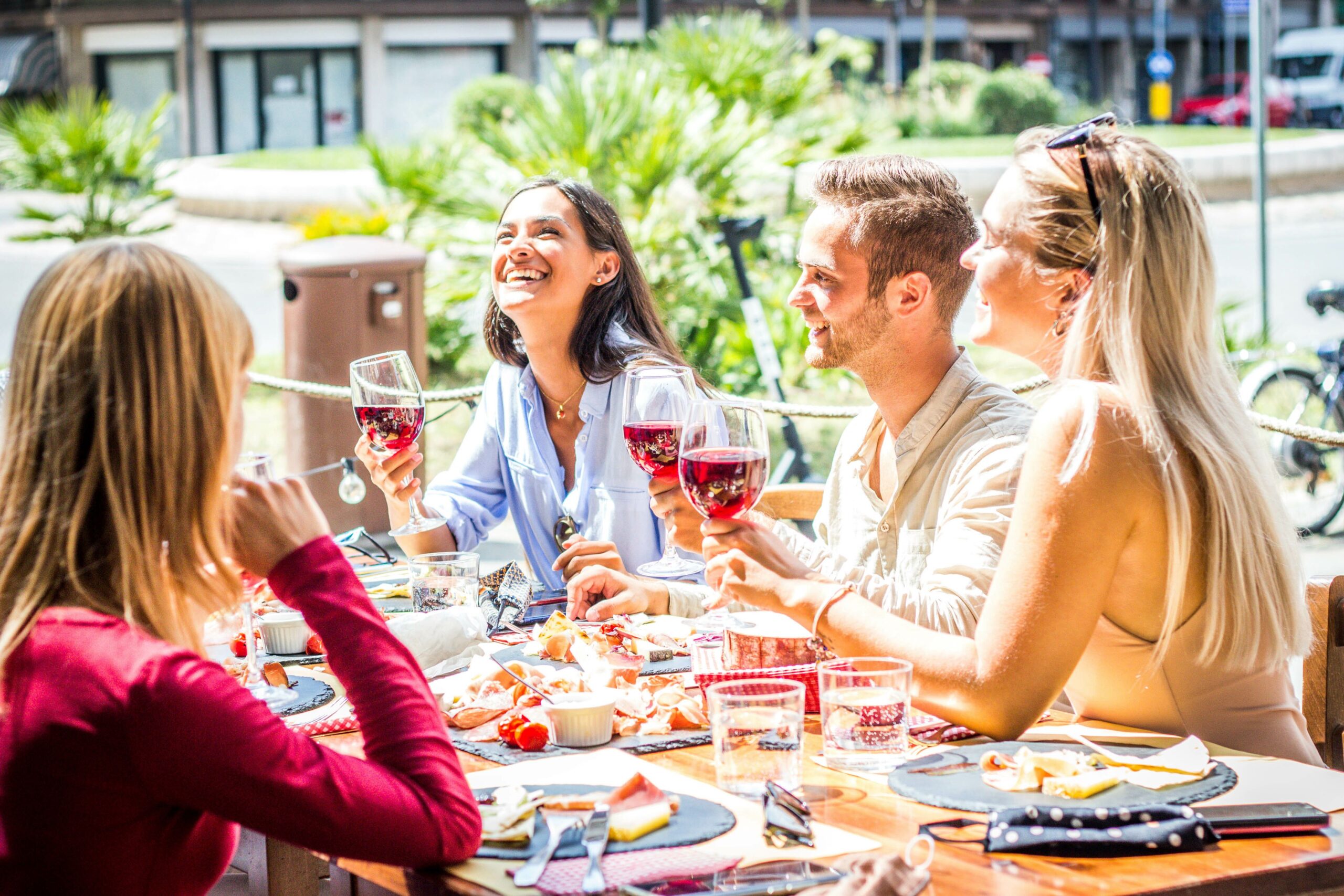 friends eating outdoors together