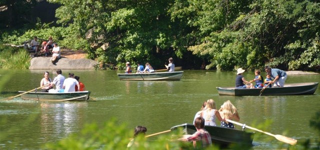 People boating and enjoying outside in Central Park