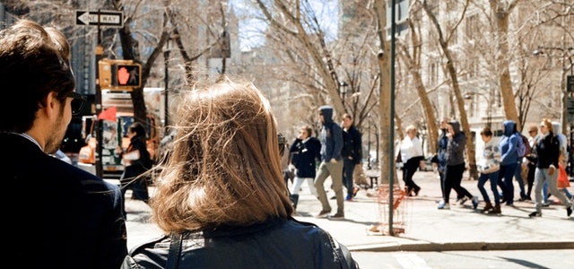 woman walking through streets of nyc