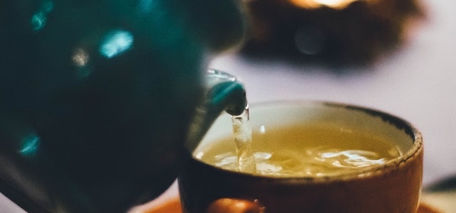 tea kettle pouring into cup