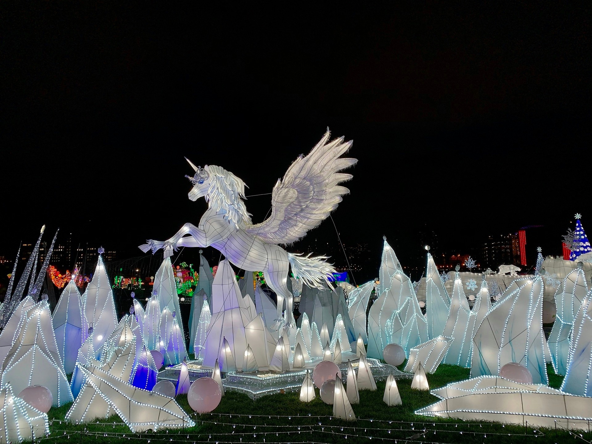 A unicorn on ice made of lights