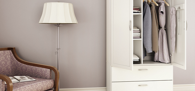A white closet in a neutral colored bedroom.