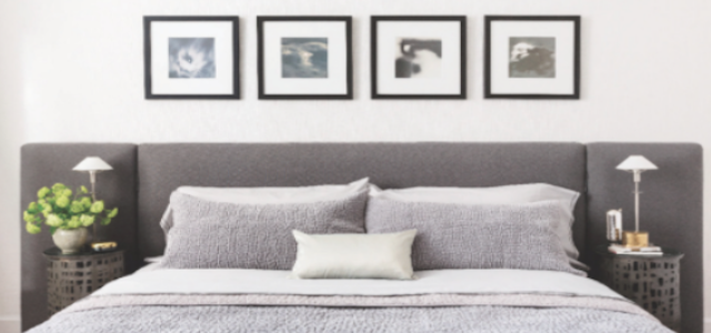 A neutral grey bedroom set at Glenwood's luxury apartments in New York City.