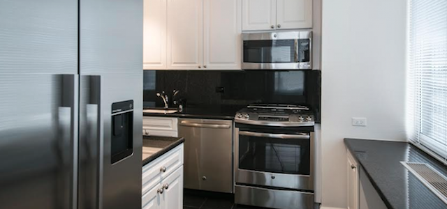 A stainless steel kitchen at Glenwood's Paramount Tower apartment building in Manhattan.