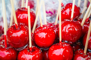 A close up of candy apples
