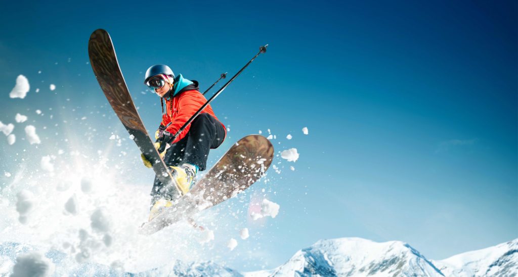 A man doing a ski trick in the air