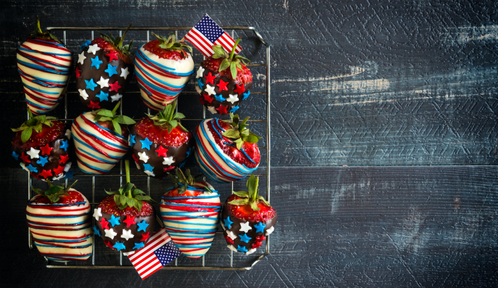 Chocolate covered strawberries with red white and blue sprinkles