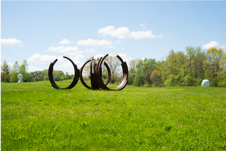 Bernar Venet sculptures in a field at Art Omi