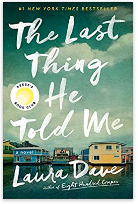 The cover of The Last Thing He Told Me by Laura Dave featuring house boats in Seattle. 