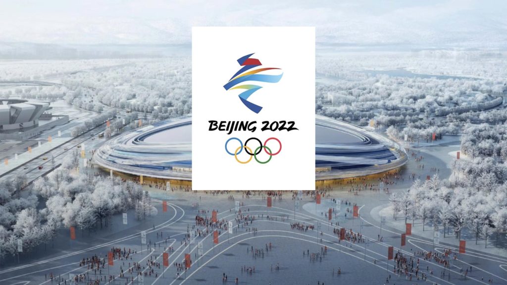Beijing 2022 Winter Olympics icon in front of the olympic opening ceremony dome