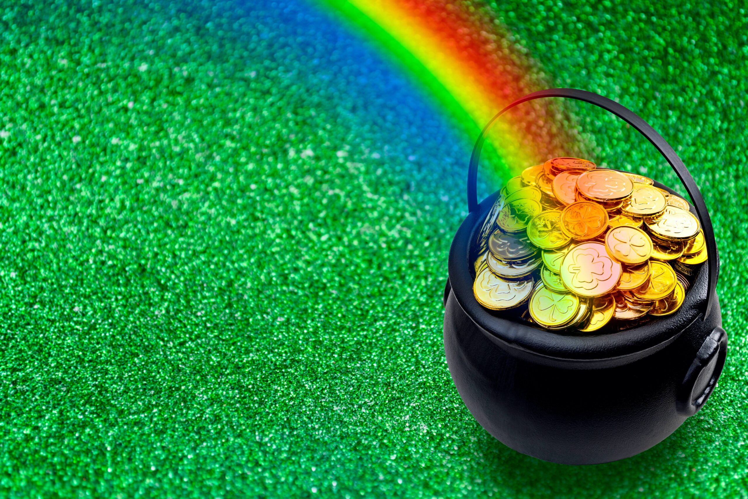 pot of gold with rainbow on green turf