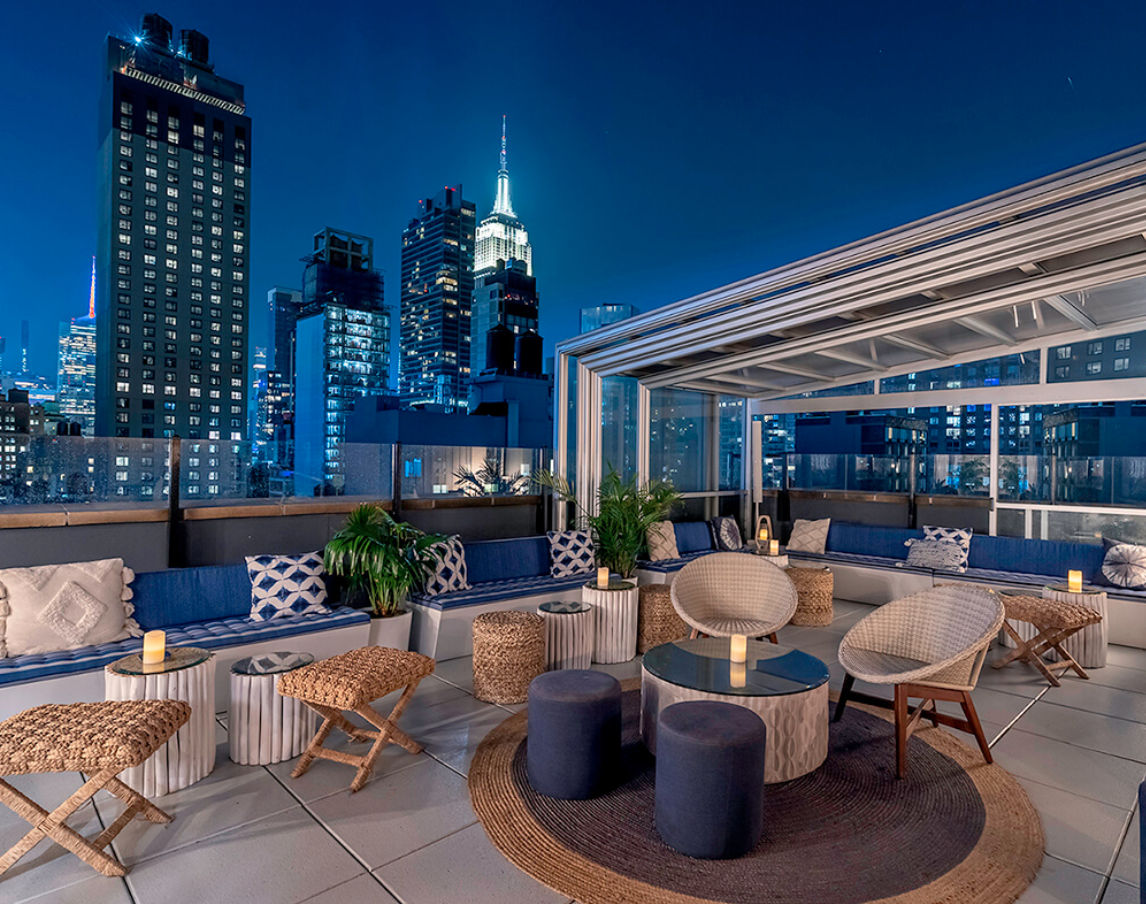 beautiful lounge area of sandbar rooftop lounge in NYC