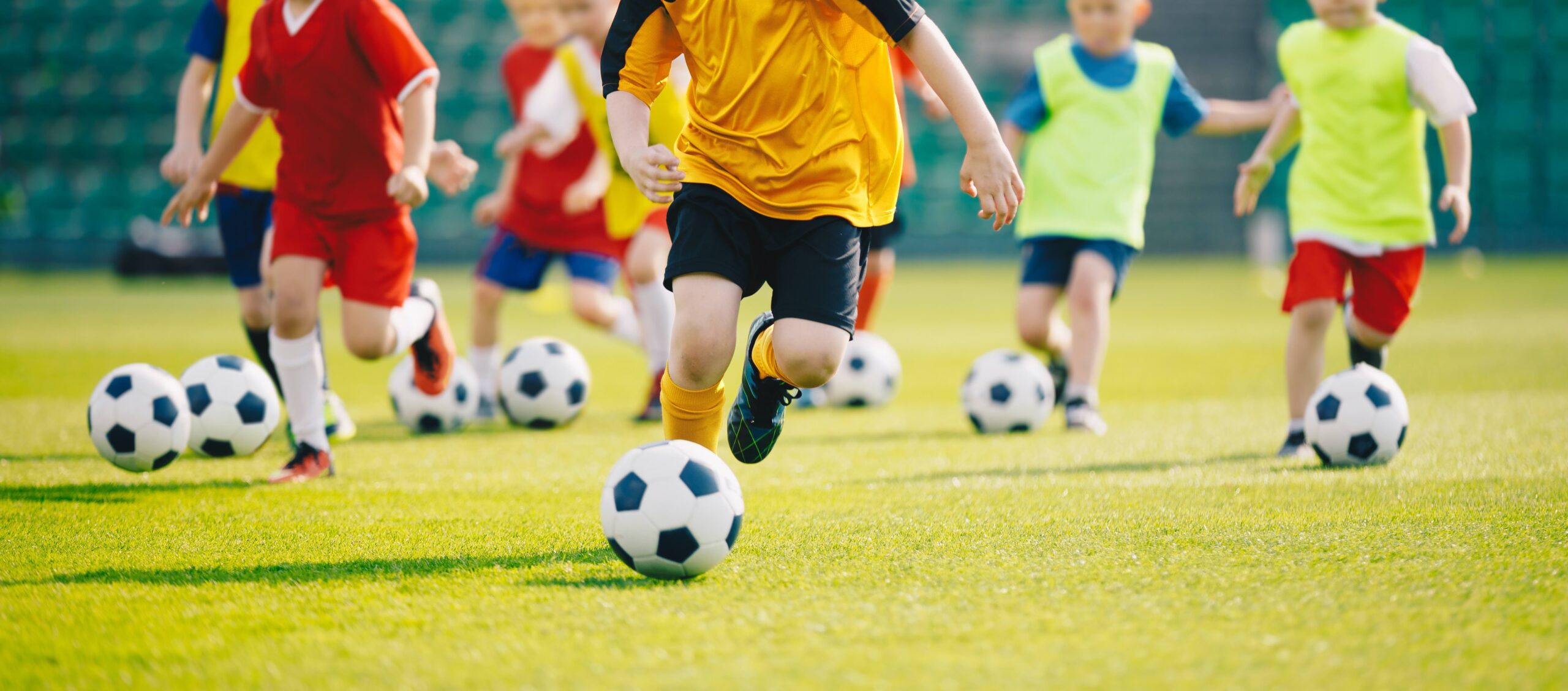 Children kicking a soccer ball